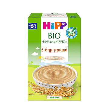 Ένα πράσινο κουτί με τη λέξη "BIO" σε περίοπτη θέση περιέχει ένα μπολ με ένα τρόφιμο μπεζ χρώματος, το οποίο περιβάλλεται από απεικονίσεις σιταριού και δημητριακών.