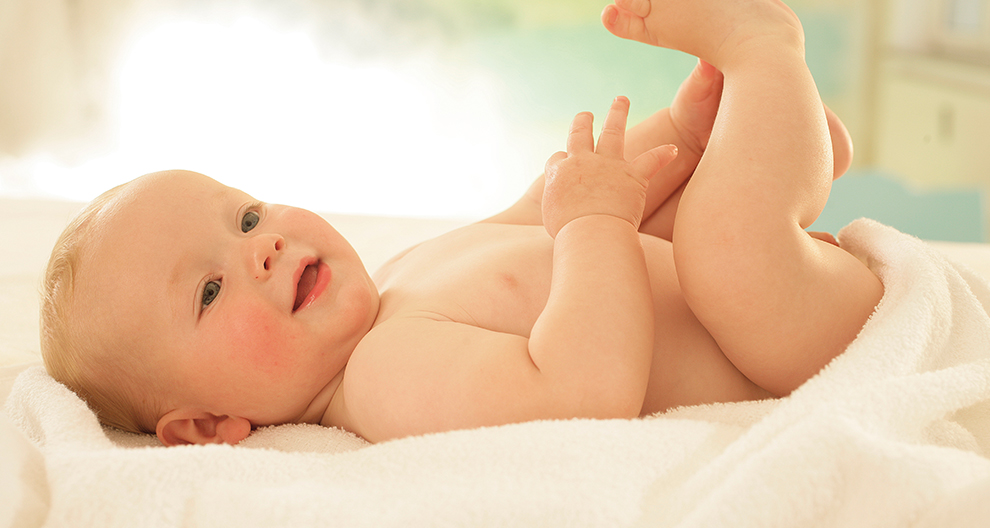 Baby, blanket, smile.
